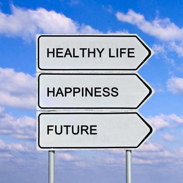 functional medicine health coaching: signs saying healthy life, happiness, future